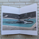Cars In Swimming Pools by Apologies Press