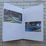Cars In Swimming Pools by Apologies Press